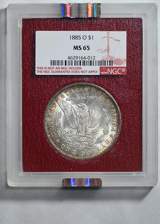 1885-O Morgan Dollar $1 Paramount NGC MS65 - TONED!