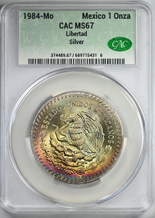 1984-Mo Mexico Silver Libertad 1 Onza CAC MS67 - RAINBOW TONED!