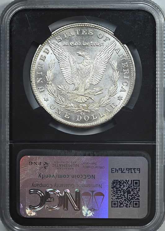 1890-CC Morgan Dollar $1 NGC Brilliant Uncirculated with Original Bag Fragment