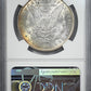 1886 Morgan Dollar $1 NGC MS65 CAC - TEXTILE TONED!