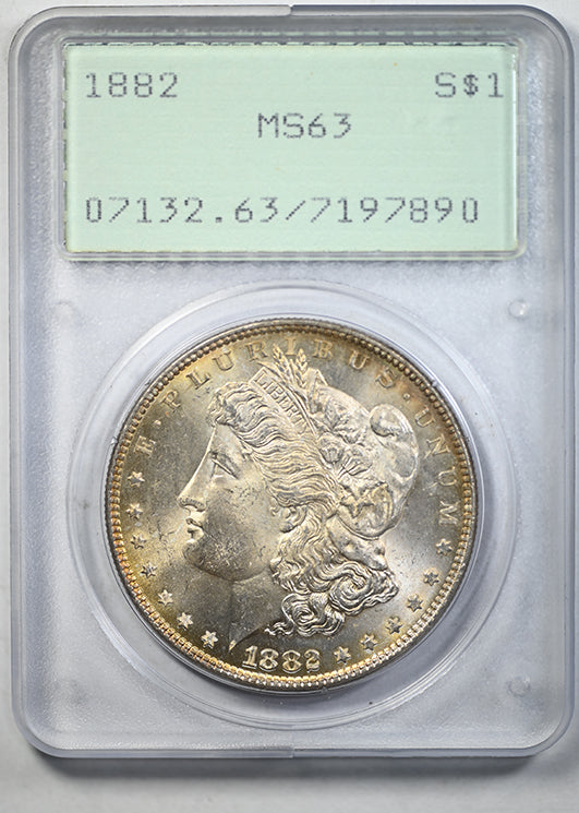 1882 Morgan Dollar $1 PCGS Rattler MS63 - TONED!