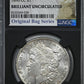 1890-CC Morgan Dollar $1 NGC Brilliant Uncirculated with Original Bag Fragment
