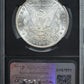 1890-CC Morgan Dollar $1 NGC Brilliant Uncirculated with Original Bag Fragment